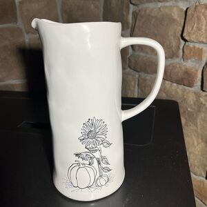 Vtg Pier 1 white (9.5"tall; 4"wide at the base) Stoneware Water Pitcher.